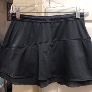 Athleta tiered charcoal grey tennis skirt with metallic waistband